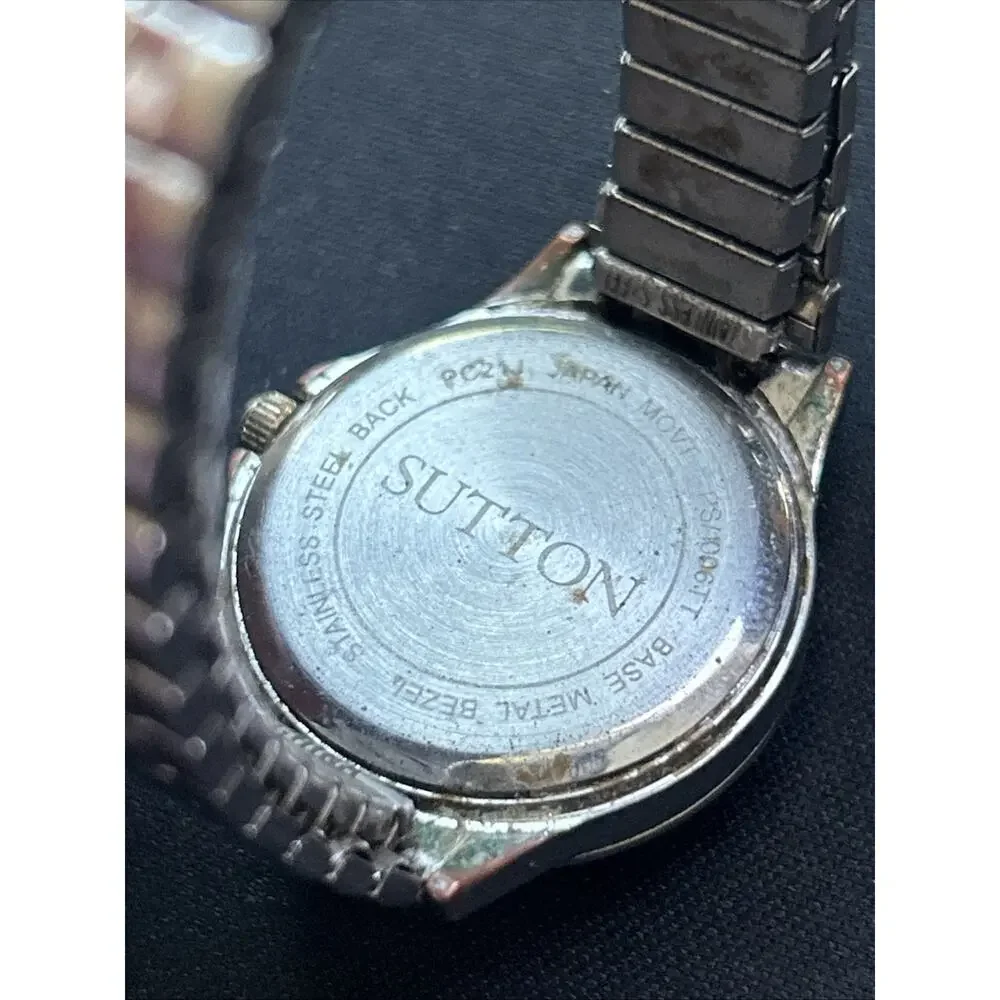 Sutton Silver Tone Worn Bronze Tone Bezel Women’s Stretch Band Quartz Watch